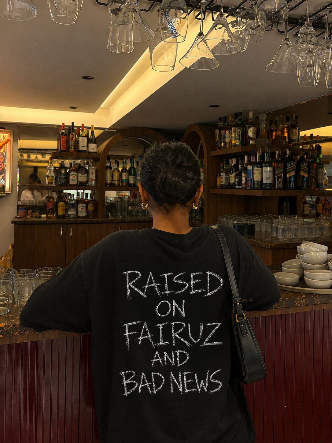 Raised On Fairuz And Bad News — Oversized Tee